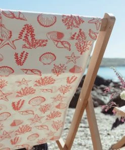 Magic Textiles Shells, Seaweed & Starfish Organic Linen Fabric - Coral On Off-White